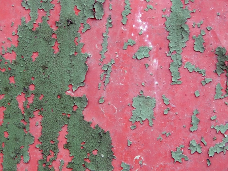 The surface texture of the old metal fence close-upの写真素材