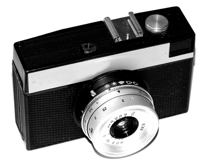 Old film camera on black and white closeup pictureの写真素材