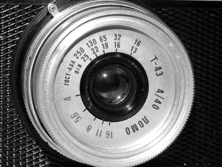Old film camera on black and white closeup pictureの写真素材