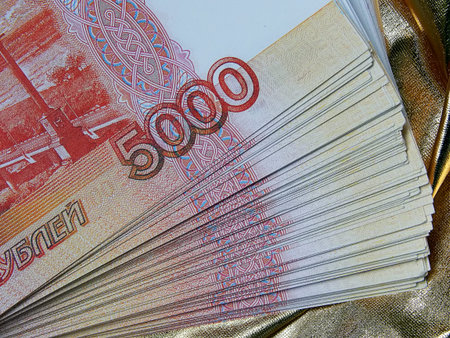 Russian currency for 5000 rubles on a gold background