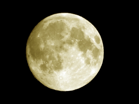 Full moon in the night sky during the eclipseの写真素材