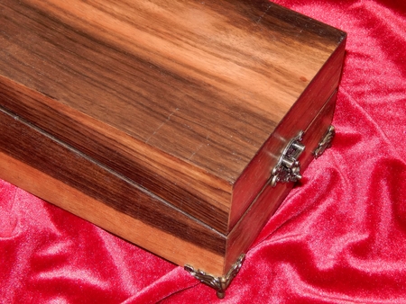 Casket for jewelry in modern style on a velvet backgroundの写真素材