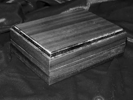 Handmade caskets of solid walnut woodの写真素材