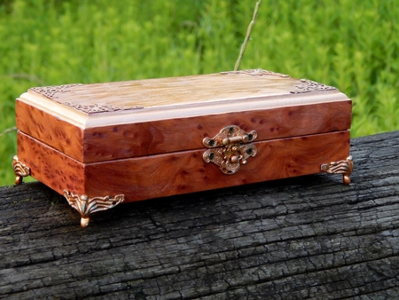 Box of mahogany wawona handmade on a green backgroundの写真素材