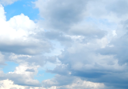 Blue sky with clouds after the rain close upの写真素材