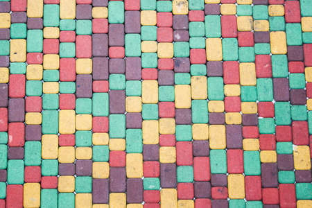 Background of colored brick walkwayの写真素材