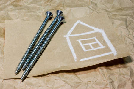 Screws on vintage paperの写真素材