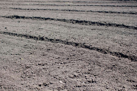 Freshly Plowed Field In Spring Ready For Cultivationの写真素材