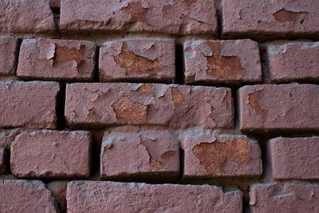 rough old stone texture of an ancient brick wall of monochrome toneの写真素材
