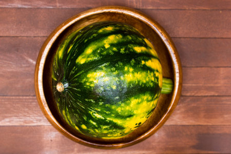 pumpkin on wooden board