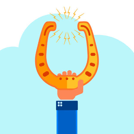 Golden horseshoe in handのイラスト素材