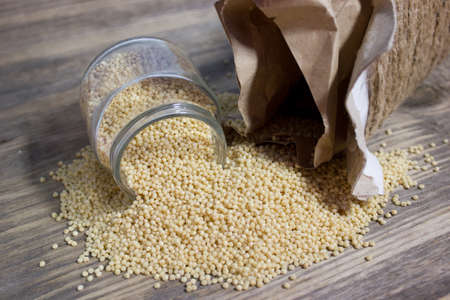 Couscous for a healthy diet on wooden backgroundの写真素材