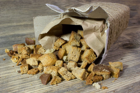 Homemade croutons on wooden backgroundの写真素材