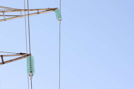 High voltage line on blue sky backgroundの写真素材