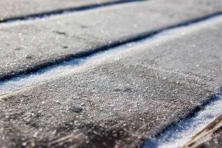Wooden boards covered with frostの写真素材