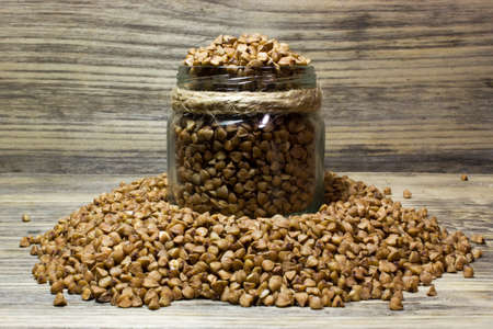 Buckwheat on wooden backgroundの写真素材