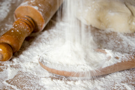 The Bakes table with flour.