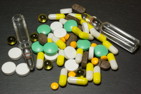 Pills medicine on dark background