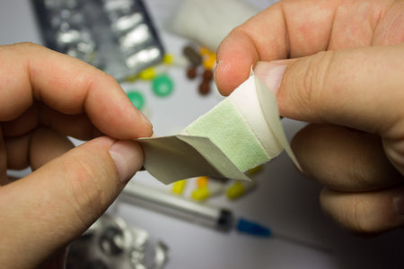 Medical tape in hands