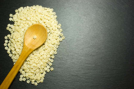 Asterisks noodles and wooden spoonの写真素材