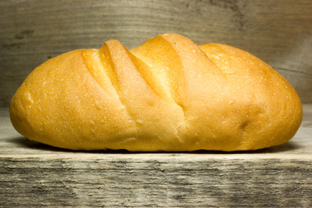 Baguette bread on wooden background