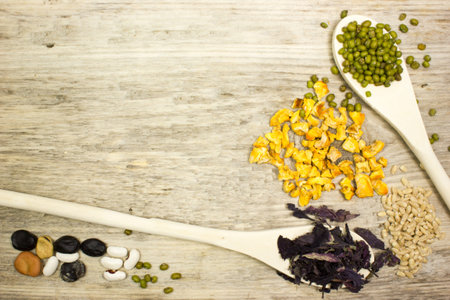 Kitchen tools and spices on wooden tableの写真素材