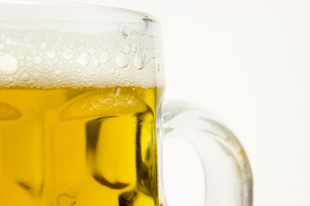 Mug of beer on white background