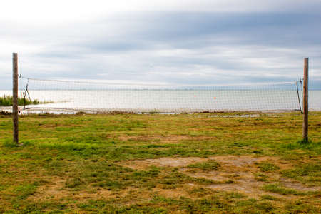 Volleyball net on the sea backgroundの写真素材
