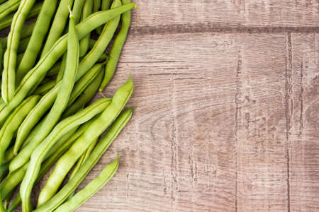 Fresh green beans on woodenの写真素材