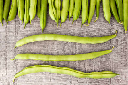 Fresh green beans on woodenの写真素材
