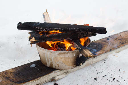 The fire is burning in the bowl BBQの写真素材