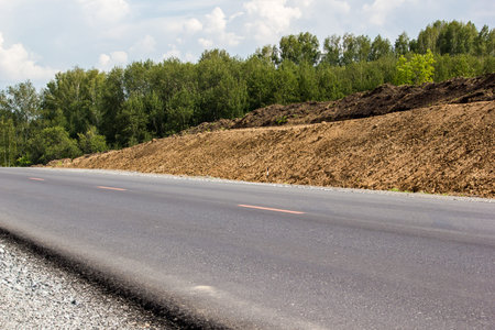 Old asphalt road with dividing line