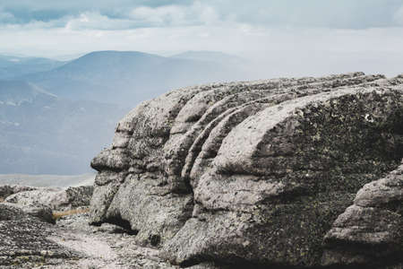 Beautiful mountains and rocks in the sky with cloudsの写真素材