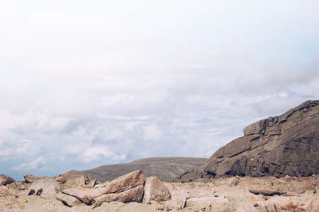 Beautiful mountains and rocks in the sky with cloudsの写真素材