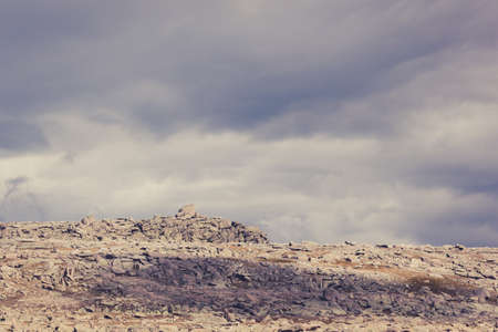 Beautiful mountains and rocks in the sky with cloudsの写真素材