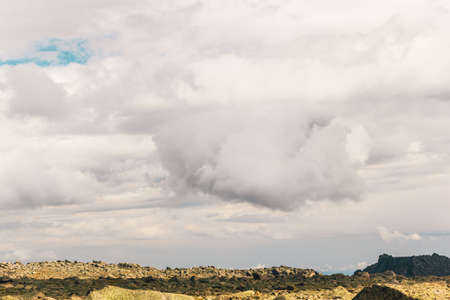 Beautiful mountains and rocks in the sky with cloudsの写真素材