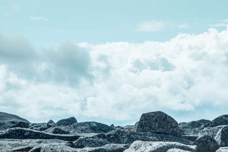 Beautiful mountains and rocks in the sky with cloudsの写真素材