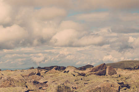 Beautiful mountains and rocks in the sky with cloudsの写真素材