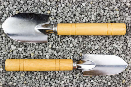 Trowel on the gray gravel. Garden tools, gardening.の写真素材