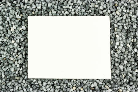 Grey fine gravel as background, place for textの写真素材