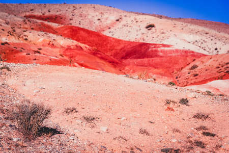 View of the red mountains and hills, the Martian landscape of Kyzyl-Chin.の写真素材