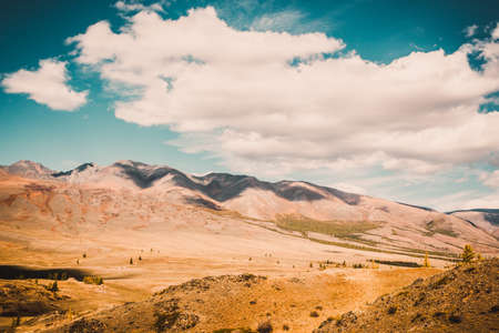 View of the mountain valley. The hills under a colorful sky.の写真素材