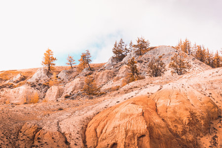 View of the red mountains and hills, the Martian landscape of Kyzyl-Chin. Travel to the national...