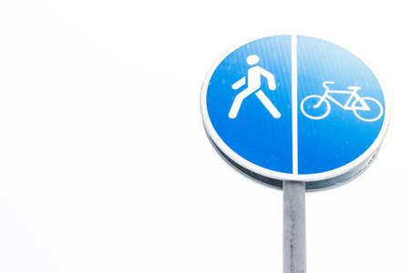 Blue Bicycle track sign on white backgroundの写真素材