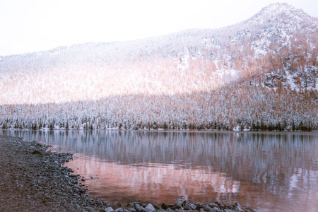 Mirror surface of the lake with a mountain range on the horizon. Travel to the national Park in the...