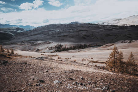 View of the mountain valley. The hills under a colorful sky.の写真素材