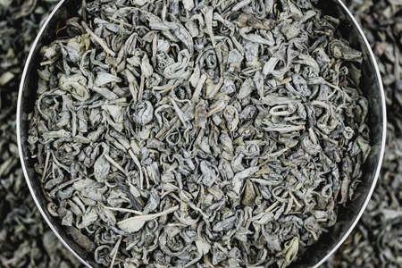 Dry green in a steel bowlの写真素材