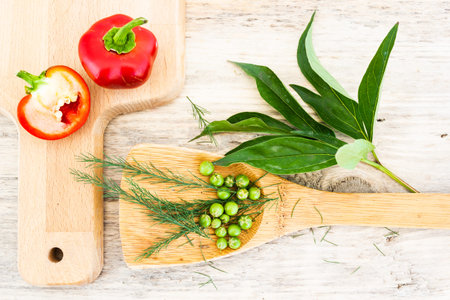 Slices of bell peppers on wooden board. Salad cooking, vegetarian menu, healthy food.;
