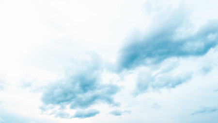 Sky with cumulus clouds at sunset or dawn. Clouds as background