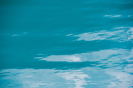 Turquoise color of river water. Blue sea, ocean for with waves